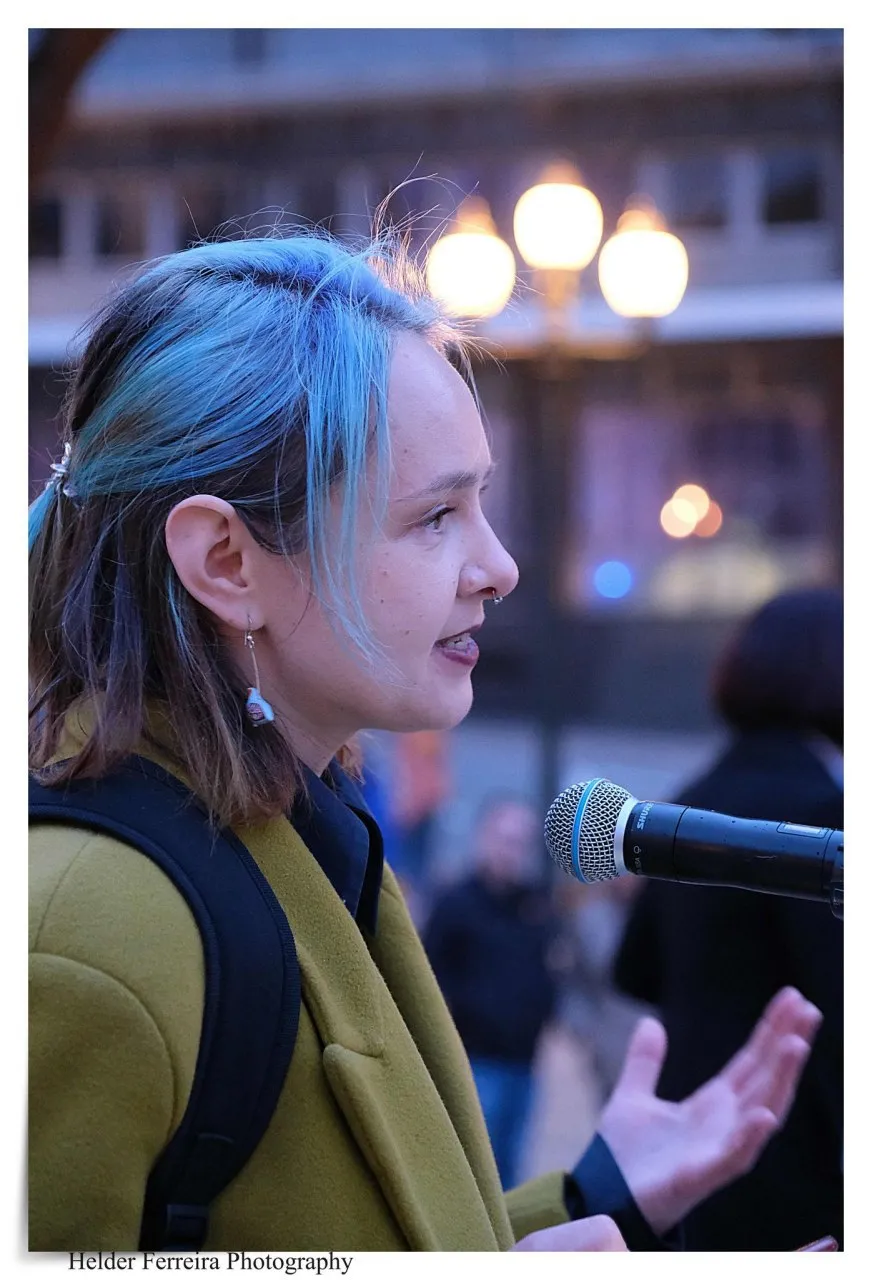 Natalia speaks at a demonstration